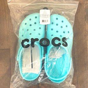 light blue Crocs. NWT.